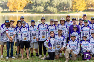 Crowd at a Boerne Bass Club 2026 spring tournament weigh-in with sponsor banners