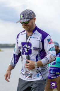 Boerne Bass Club angler holding largemouth bass at FAN tournament weigh-in, Texas Hill Country bass fishing